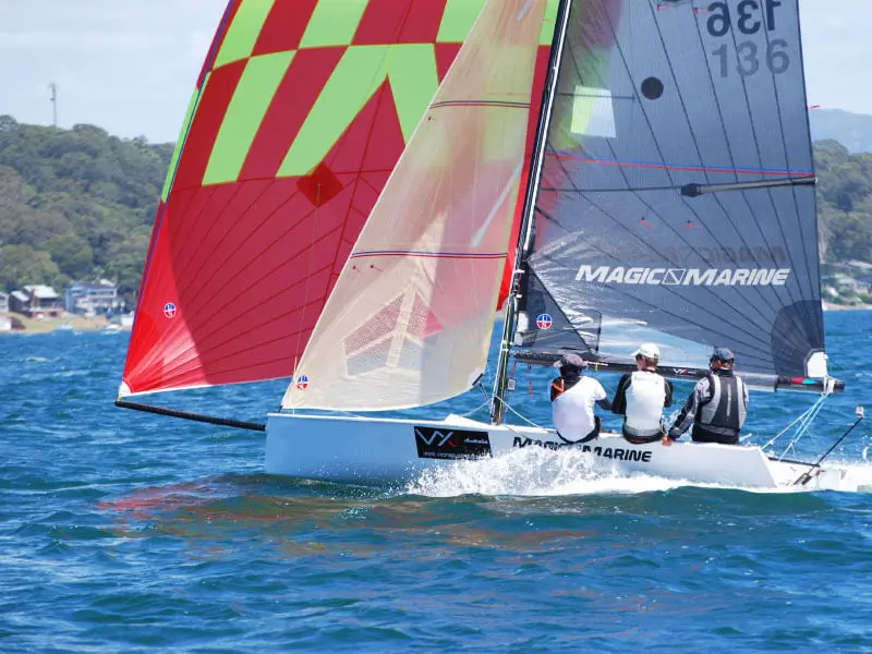 Sailboat racing on blue ocean waters