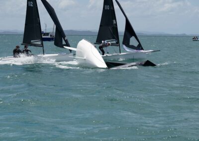 Capsized sailing boat during New Zealand yacht race